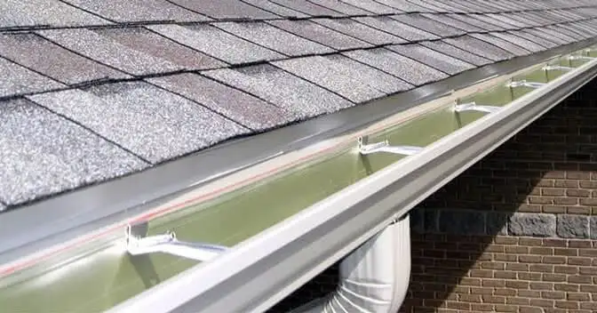 Gutter Cleaning in Dallas, TX 9 Seamless aluminum gutter installed along a home's roofline